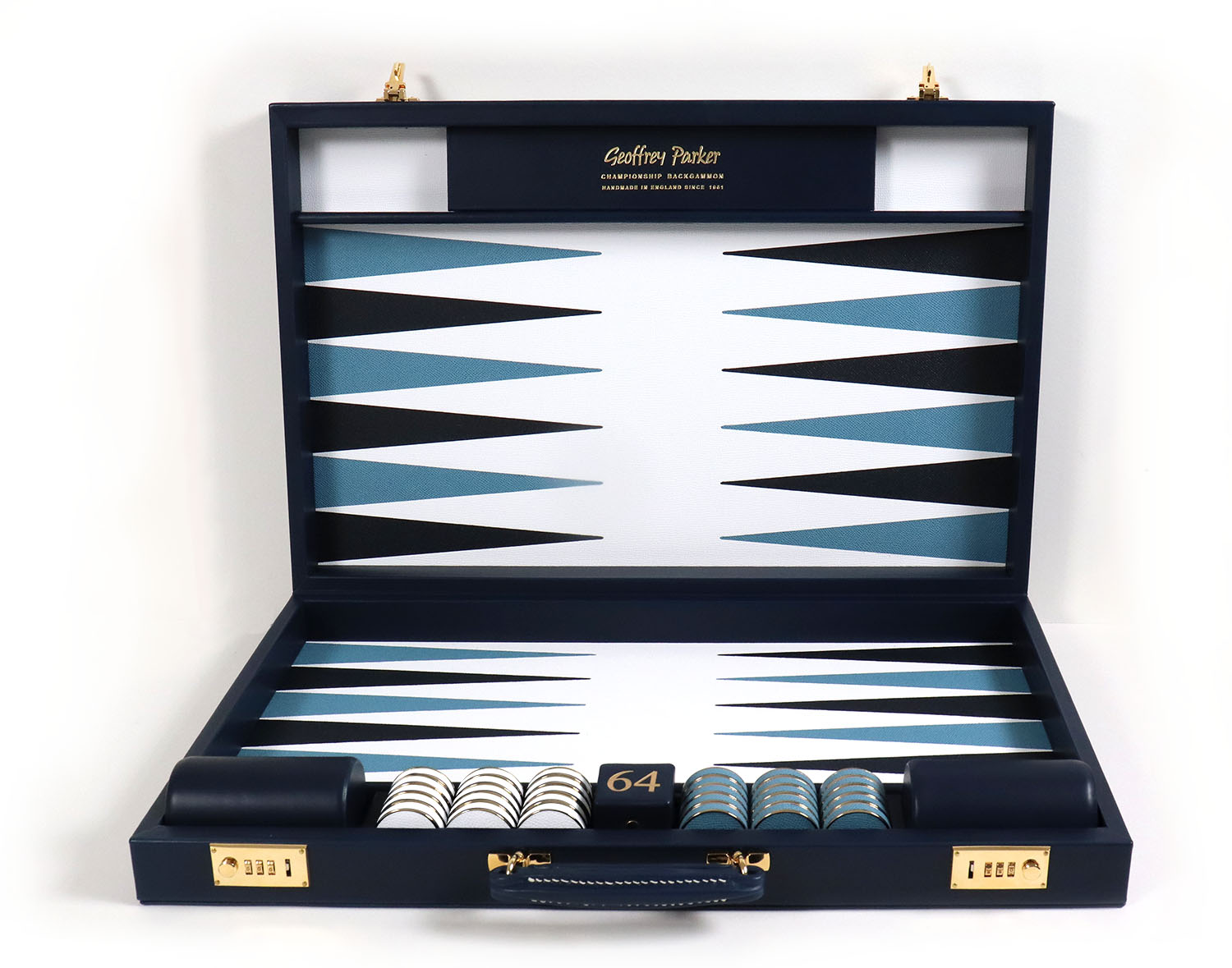 Handcrafted Bridle Hide backgammon set in deep navy leather with gilt detailing by Geoffrey Parker for EB London.