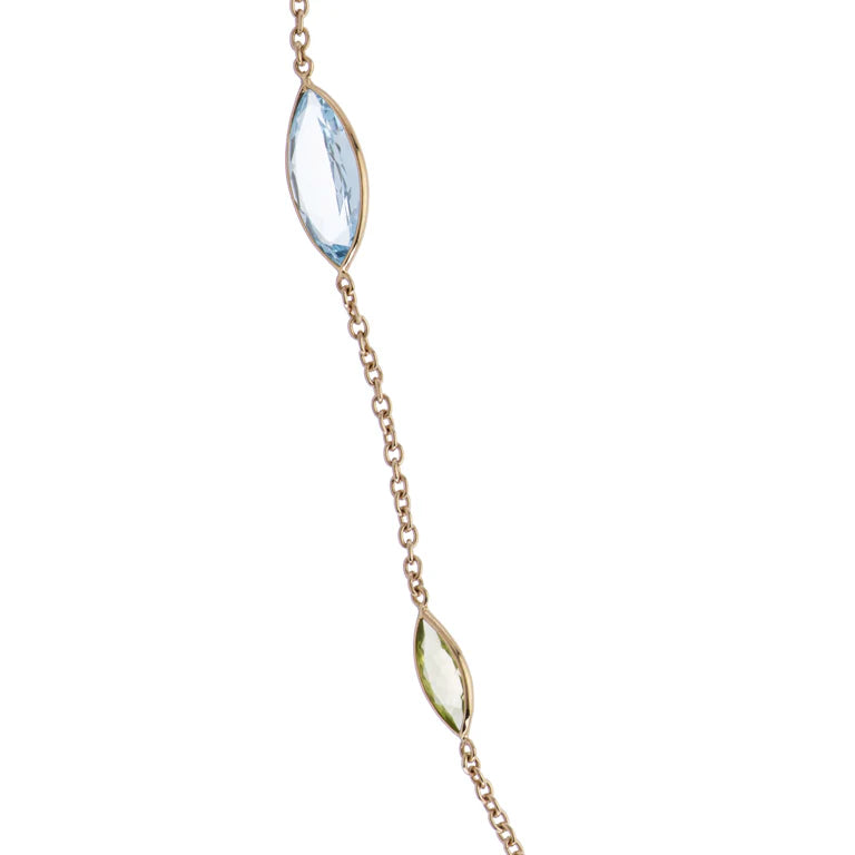 gold spectacle necklace with alternating marquise blue topaz and peridot by Deakin & Francis at EB London