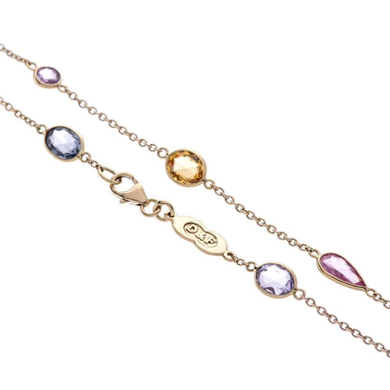 gold spectacle necklace with fourteen fancy colour and fancy shape sapphires by Deakin & Francis at EB London
