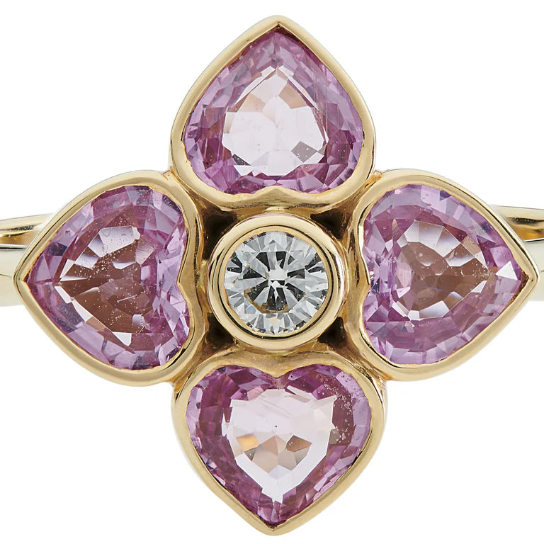 gold cluster ring with four heart-shaped pink sapphires and central diamond by Deakin & Francis at EB London