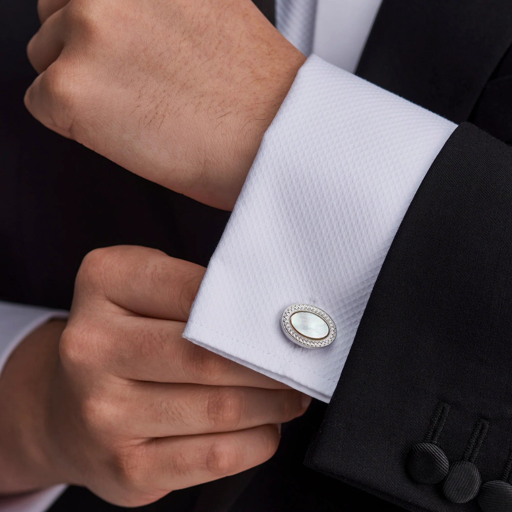 Deakin & Francis oval cufflinks with hand-cut mother-of-pearl centre, white rhodium finish and wreath pattern, handcrafted in Birmingham, at EB London