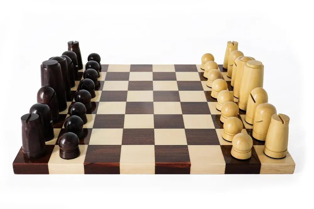 Hand-painted Maldivian chess set with illustrated luxury board and culturally inspired chess pieces, handcrafted in England by Geoffrey Parker.