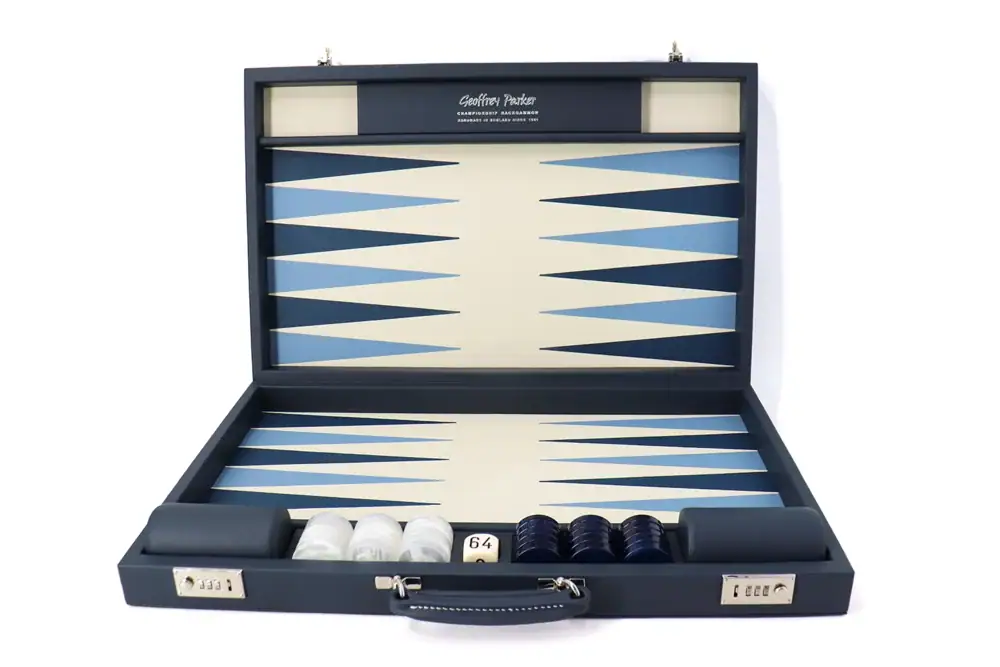 Luxury leather tournament backgammon board in Suffolk Blue with blue and white acrylic checkers, handcrafted in England by Geoffrey Parker for EB London.