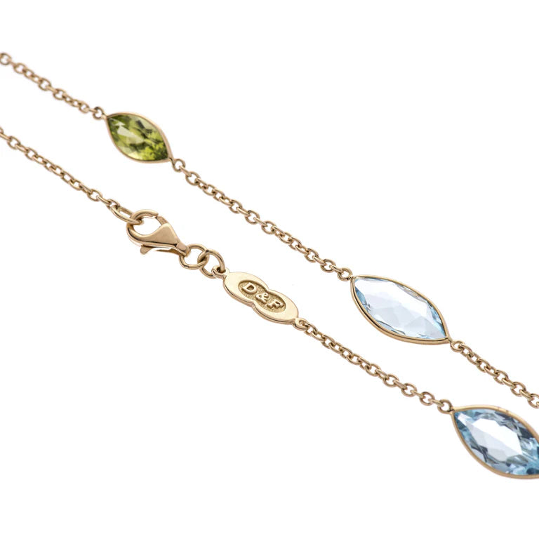 spectacle necklace with alternating marquise blue topaz and peridot by Deakin & Francis at EB London