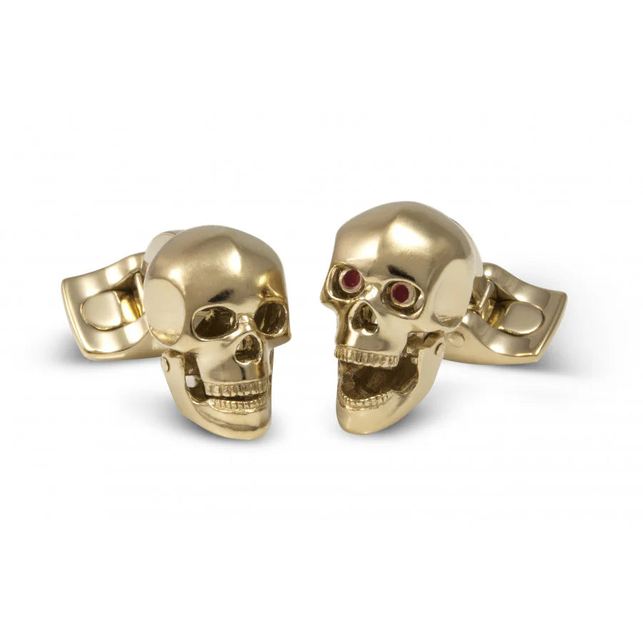 Yellow gold finnish skull cufflinks with jaw mechanism and hand-enamelled red eyes by Deakin & Francis at EB London