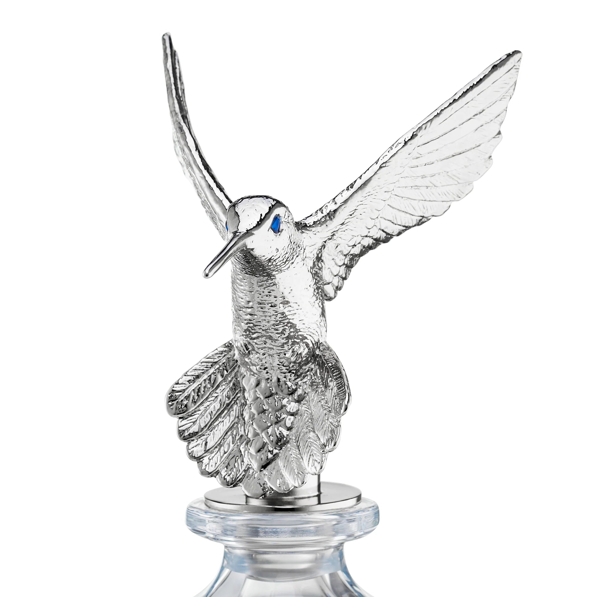crystal glass decanter with metal-plated hummingbird stopper and hand-enamelled eyes, Dartington glass with Birmingham-made stopper, available at EB London