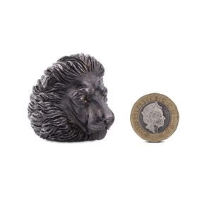 Oxidised silver proud lion ring with cognac diamond eyes by Deakin & Francis at EB London