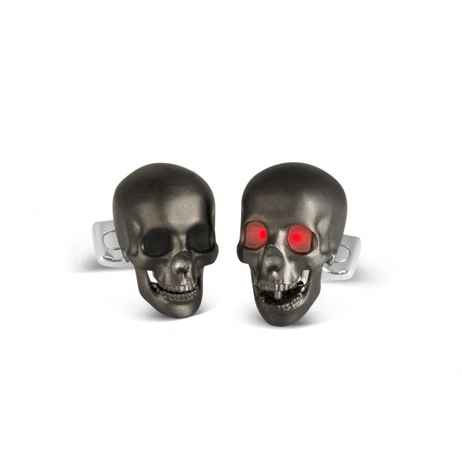 Matte black skull cufflinks with LED light eyes and jaw mechanism by Deakin & Francis at EB London