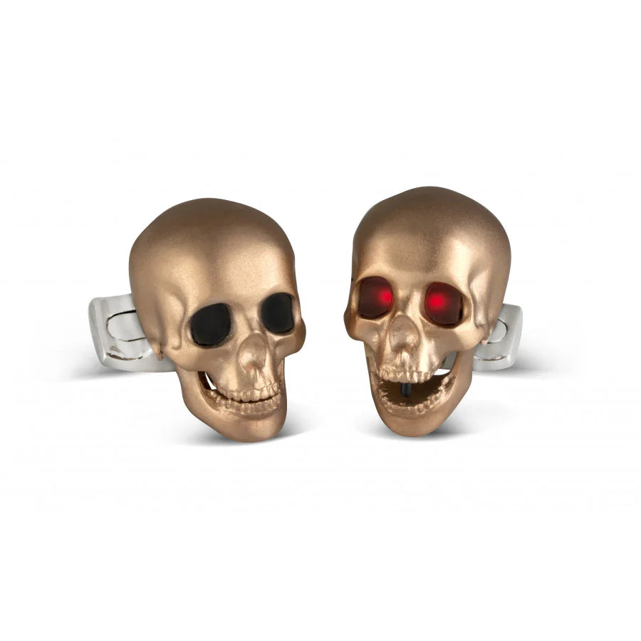 Rose gold satin skull cufflinks with LED light eyes and jaw mechanism by Deakin & Francis at EB London