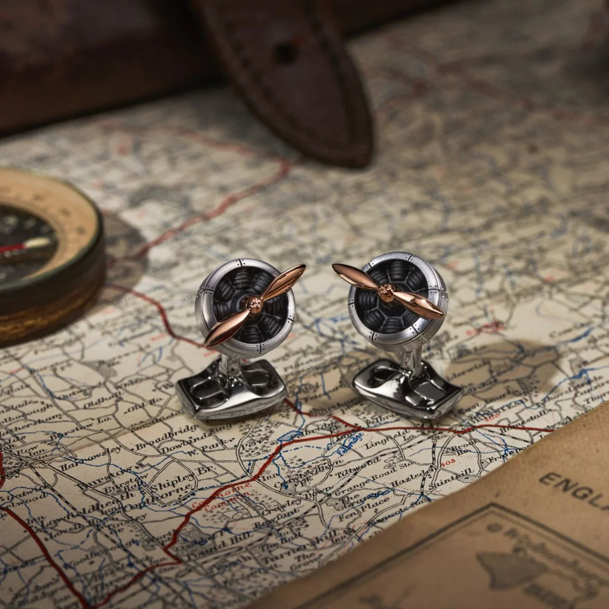 Sopwith propeller cufflinks with spinning rose gold blades and aircraft grade by Deakin & Francis at EB London