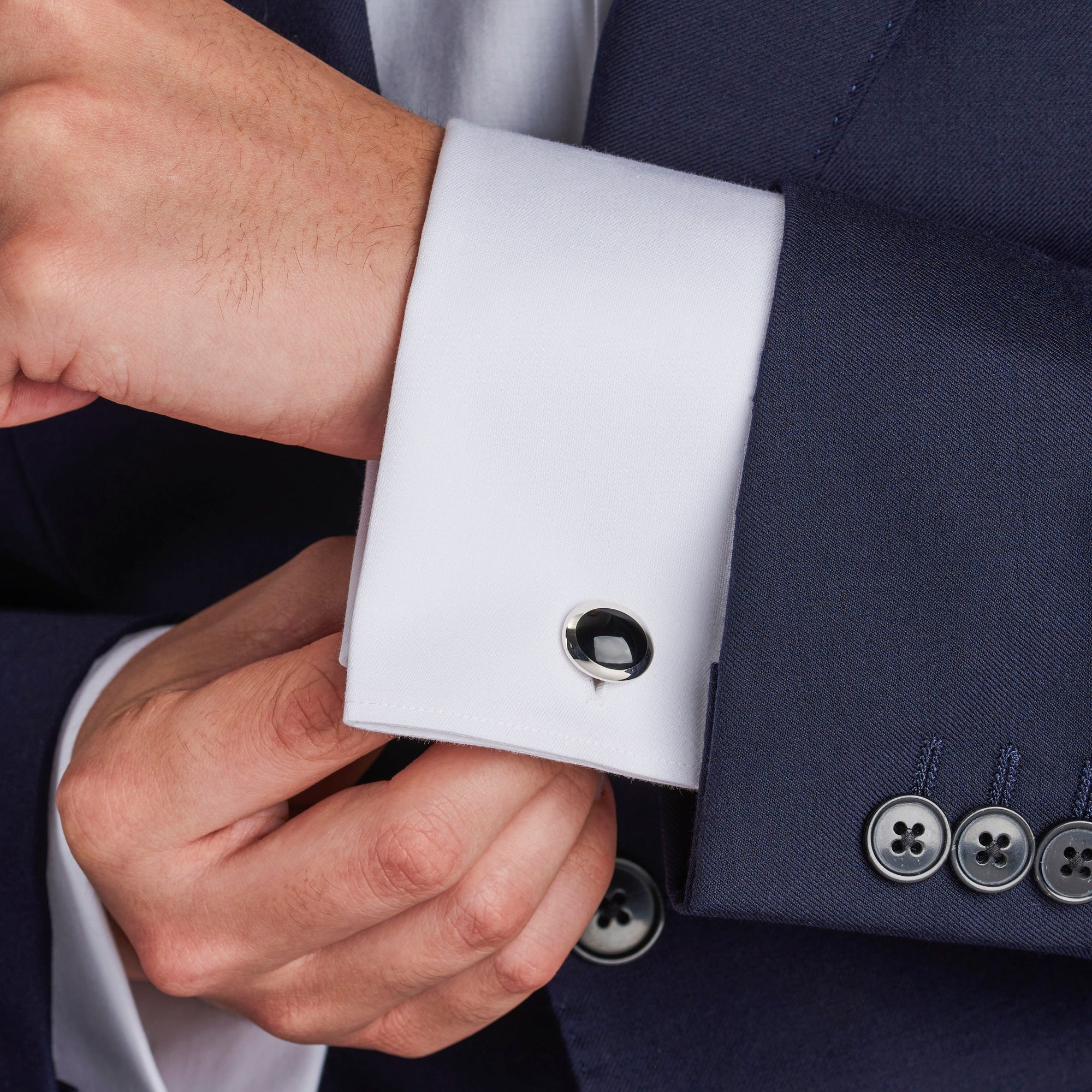 silver oval cufflinks with hand-cut black onyx inlay by Deakin & Francis at EB London