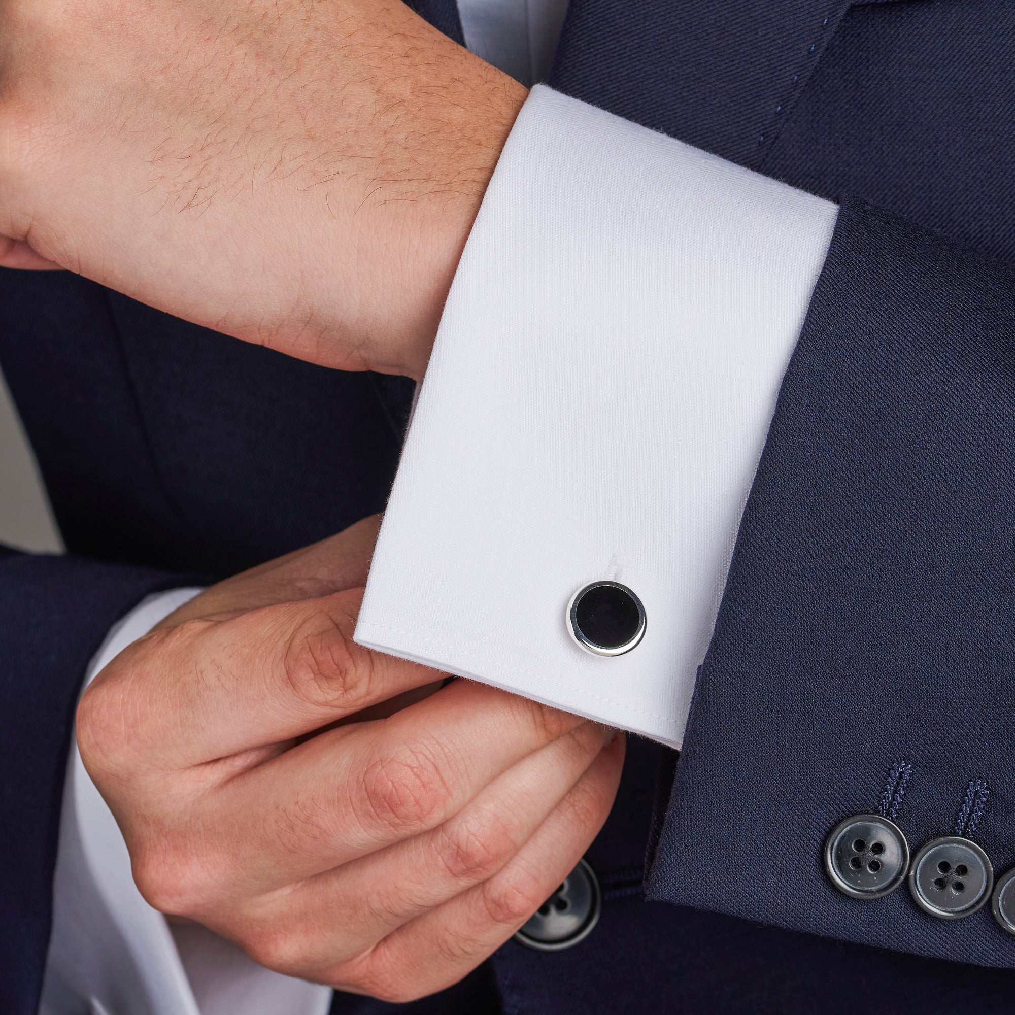 silver round cufflinks with black onyx inlay by Deakin & Francis at EB London