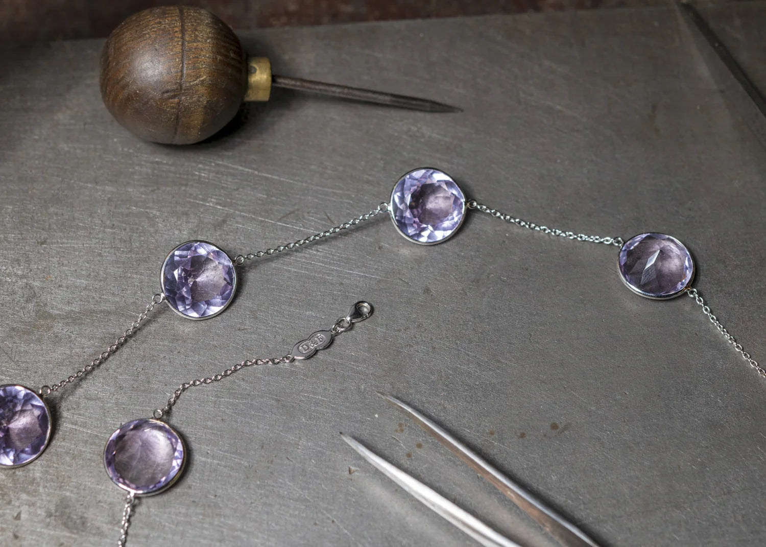 gold necklace with eight pale purple amethyst gemstones by Deakin & Francis at EB London