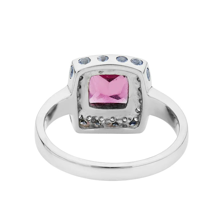 gold ring with princess cut rubellite, diamond border and blue sapphire accents by Deakin & Francis at EB London