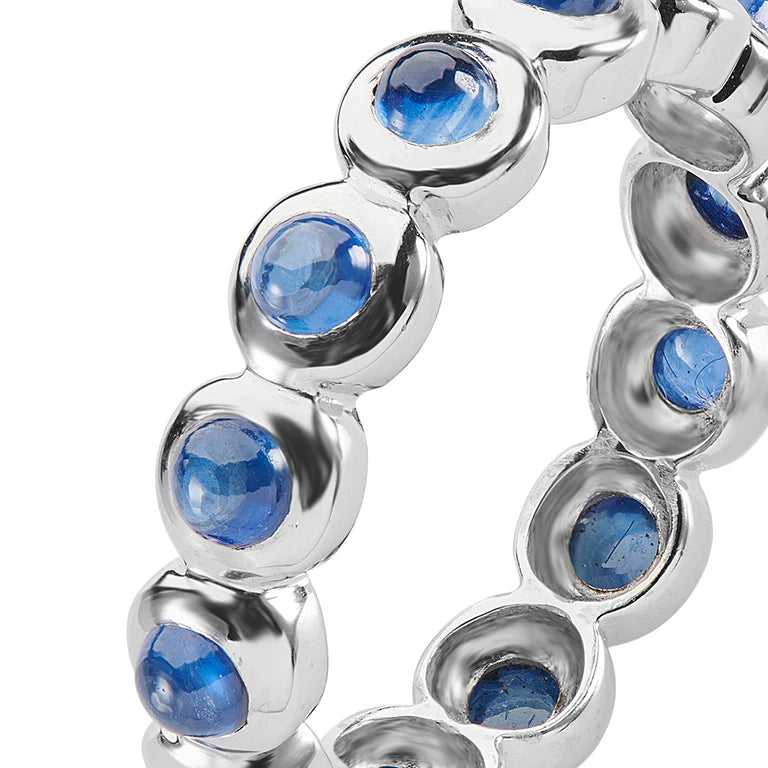 white gold cabochon sapphire eternity ring with fourteen round sapphires by Deakin & Francis at EB London